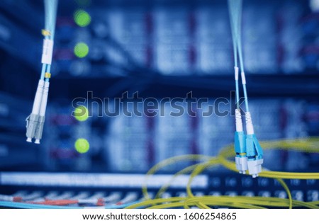 Two optical cable. Server background. 