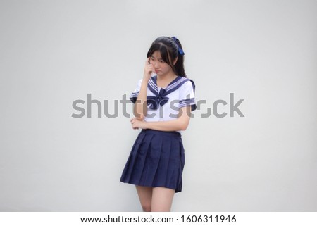 japanese teen beautiful girl in student uniform Think