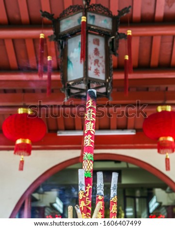 Chinese new year festival Background red candles incense sticks burning buddhist concept