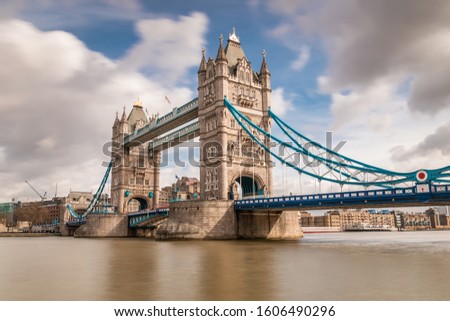 Tower Bridge London long exposure. Famous bridge standing on Thames river in England.