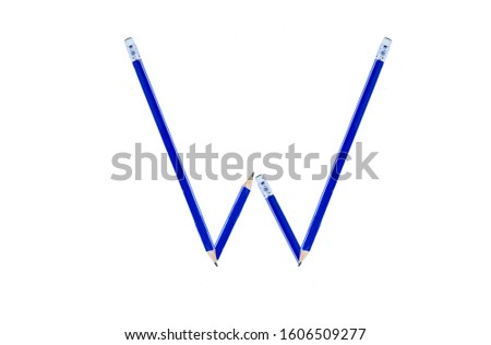 English letter " W " made up of pencils