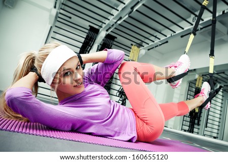 Young woman streching muscles functional training Royalty-Free Stock Photo #160655120