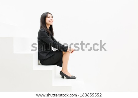asian businesswoman on white stair