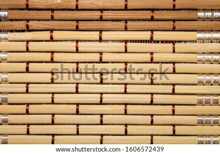 Makisu for sushi and roll.Bamboo Mat.Background of woven bamboo.Woven bamboo texture.