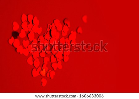A pattern of hearts on a red background. Valentine's Day concept