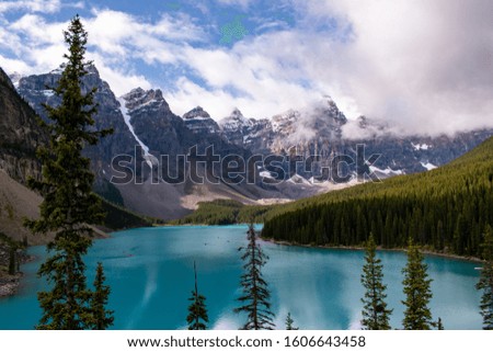Moraine Lake Alberta Canada. A famous landmark in Canada. Amazing turquoise water with stunning mountain peaks.