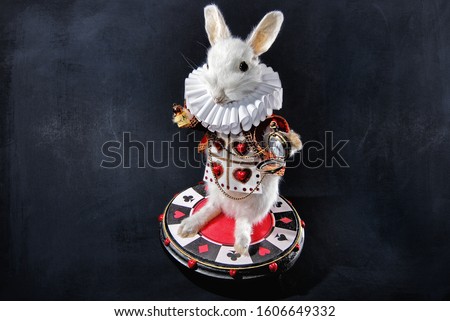 White Rabbit dressed by the Queen of hearts
