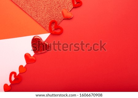 Valentines day card with copy space, frame. Red background with different hearts. Concept of Valentine Day,Love, romance, Heart.Valentines day composition, pattern on red background.Top view,flat lay.