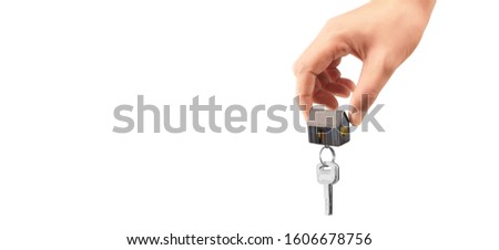 Real estate agent handing over house keys in hand.business idea