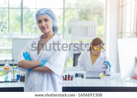Portrait, asian woman scientist chemistry experiments in lab room, Teamwork scientific research concept.
