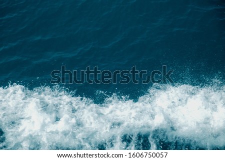Aerial view of a breaking wave in the  Ocean