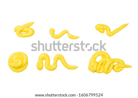 Yellow cheese sauce splashes isolated on white background. 