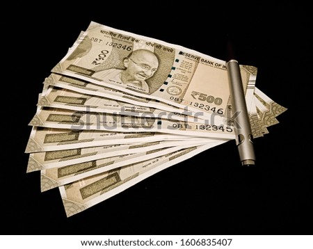Reserve Bank of bank currency 500 rupee note presented on black background isolated 