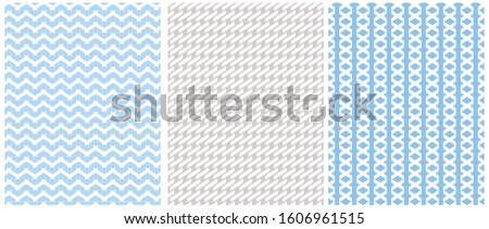 Pastel Color Seamless Geometric Vector Patterns. Regular White Chevron Isolated on a Blue Background. White Geometric Ornament on a Blue and Light Gray Layout. Simple Abstract Design Vector Print.