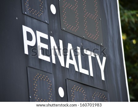 The word Penalty on a black baseball scoreboard