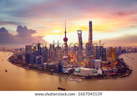 Sunset and  Cityscape of Shanghai, China city skyline on the Huangpu River.
