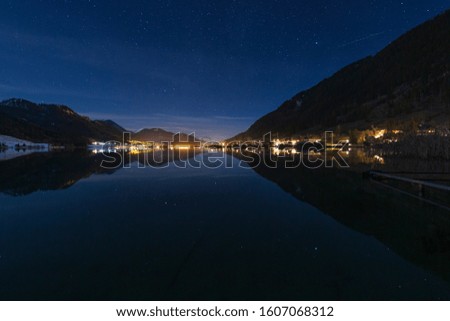 Starry night at lake Weissensee in Carinthia, Austria