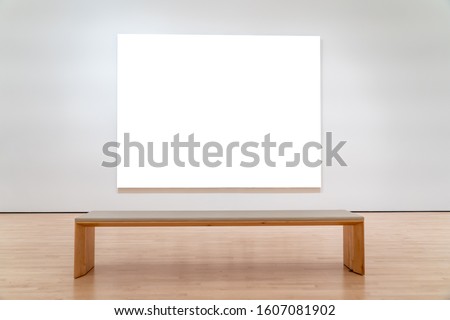 White mockup billboard in front of a bench.
