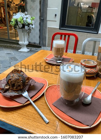 Coffee and muffin in the street cafe
