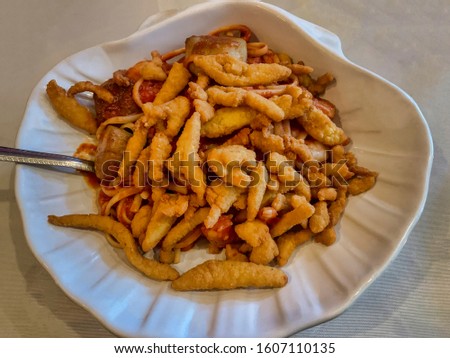 Fried calamari strips for appetizer.