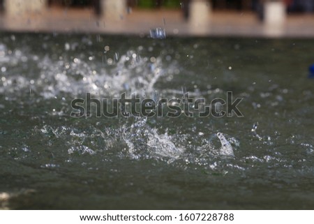 drop water flowing on surface