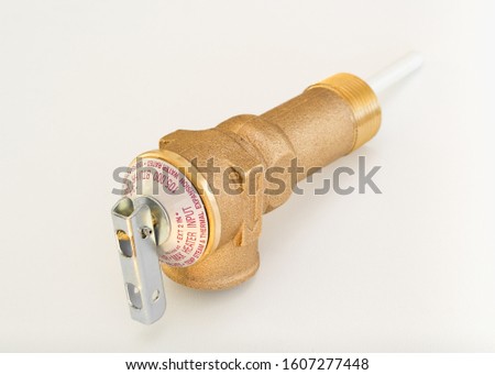 Temperature and pressure relief or TPR valve on white. Royalty-Free Stock Photo #1607277448