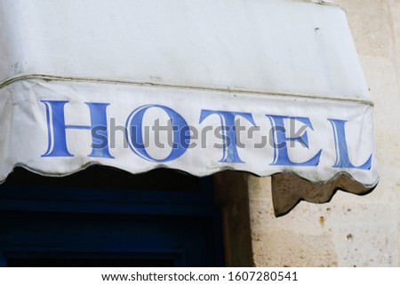 Hotel sign vintage retro on Building in tourist city