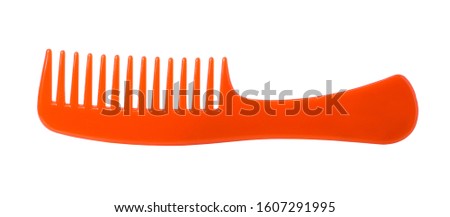 plastic red comb isolated on white background with clipping path