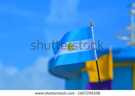 Beautiful National Flag of Argentina on Tropical Beach