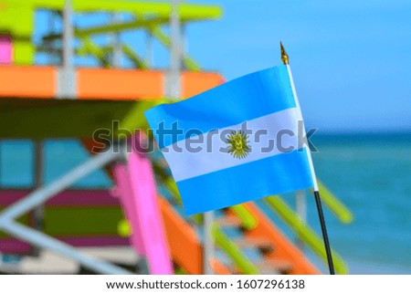 Beautiful National Flag of Argentina on Tropical Beach