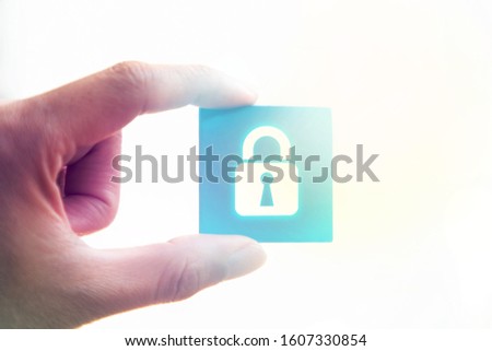 Hand holding lock icon picture
