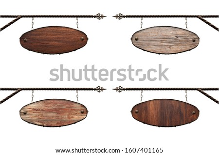 Oval wooden signboard collection. An old oval shop sign without text hangs on a wrought iron structure. Mockup isolated on white. Blank for creativity and design.