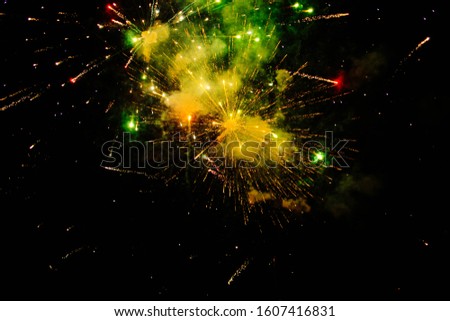 New Year celebration fireworks. Beautiful fireworks on black background.