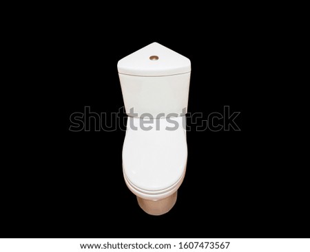 White toilet bowl isolated on black background. Bathroom equipment.