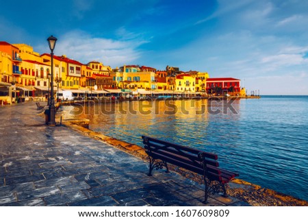 Picturesque old port of Chania. Landmarks of Crete island. Greece. Bay of Chania at sunny summer day, Crete Greece. View of the old port of Chania, Crete, Greece. The port of chania, or Hania.  Royalty-Free Stock Photo #1607609809