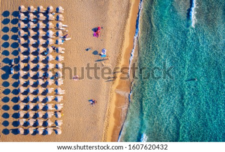Aerial shot of beautiful turquoise beach Falasarna (Falassarna) in Crete, Greece. View of famous paradise sandy deep turquoise beach of Falasarna (Falassarna) in North West, Crete island, Greece. Royalty-Free Stock Photo #1607620432