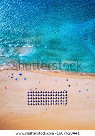 Aerial shot of beautiful turquoise beach Falasarna (Falassarna) in Crete, Greece. View of famous paradise sandy deep turquoise beach of Falasarna (Falassarna) in North West, Crete island, Greece. Royalty-Free Stock Photo #1607620441