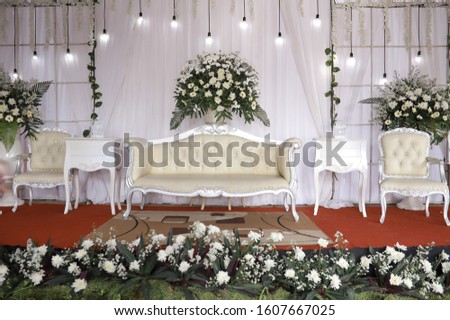 A photo of the stage bride decoration in Indonesia elegant and luxurious modern nuance