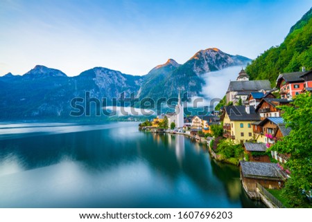 Scenic picture-postcard view of famous Hallstatt mountain village in the Austrian Alps at beautiful light in summer, Salzkammergut region, Hallstatt, Austria