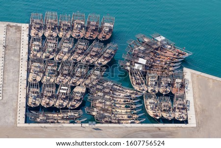 The Traditional fishing boats, (the Dhows) are anchored at the Fishing harbor of Manama, Bahrain. (A birds eye view picture) 