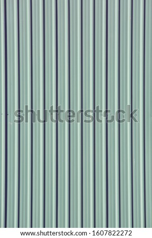 Gray Green galvanized steel plate as fence wall,Seamless abstract background with vertical lines