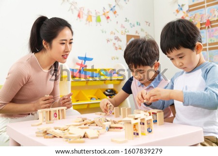 Kindergarten teachers and the children