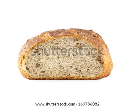 Bread from wheat flour, whole grain bread with walnuts isolated on white.