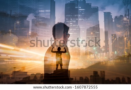 People never giving up, strength and power. Man feeling determined standing on a  mountainside flexing. Royalty-Free Stock Photo #1607872555