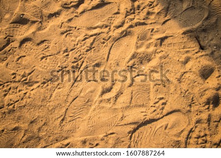 Footprint of the shoe on the beach