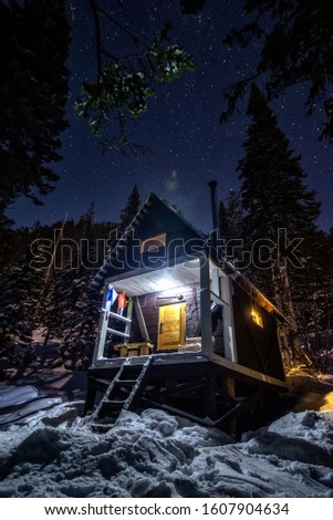 A hut in the mountains near Lake Baikal. Siberia, Russia.