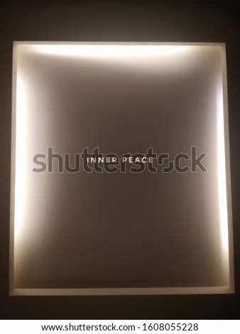 light box with dark and bright background with caption inner peace