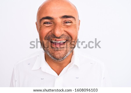 Middle age handsome man wearing elegant shirt standing over isolated white background with a happy face standing and smiling with a confident smile showing teeth