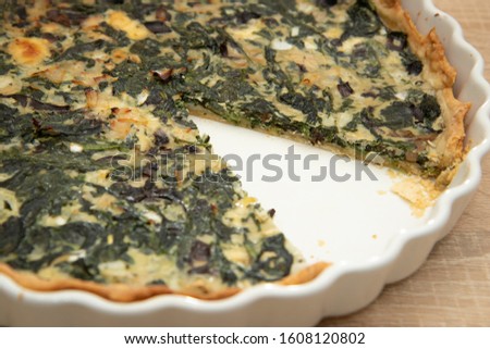 Typical French food, Quiché aux Épinards. Salty cake with spinach. 