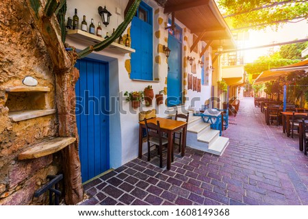 Street in the old town of Chania, Crete, Greece. Charming streets of Greek islands, Crete. Beautiful street in Chania, Crete island, Greece. Summer landscape. Chania old street of Crete island Greece. Royalty-Free Stock Photo #1608149368